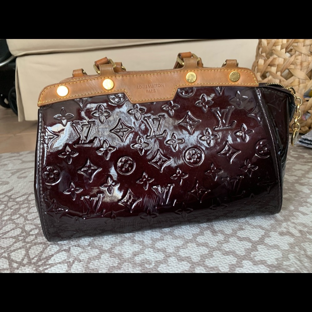 LOUIS VUITTON
Rouge Fauviste Vernis Brea PM Bag